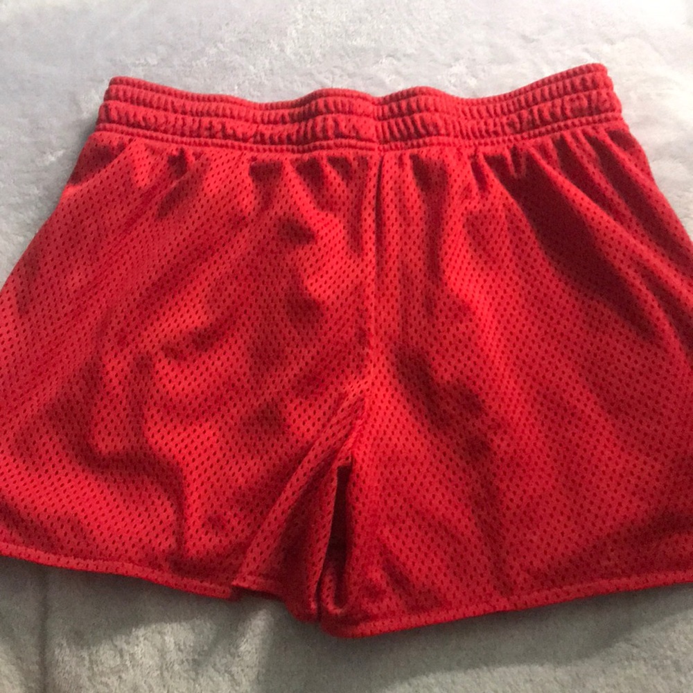 red shorts